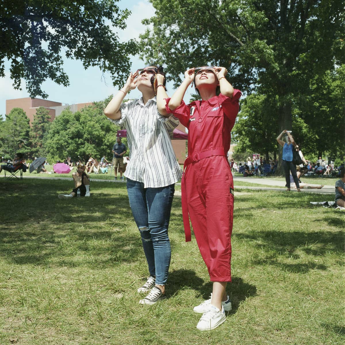 An analog portrait of two women watching the solar eclipse at SIU in Carbondale, Illinois