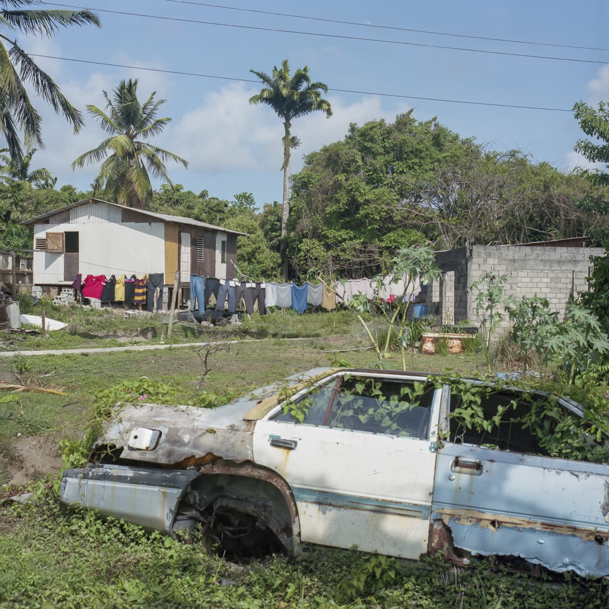 An abandoned car in a village in St. Lucia