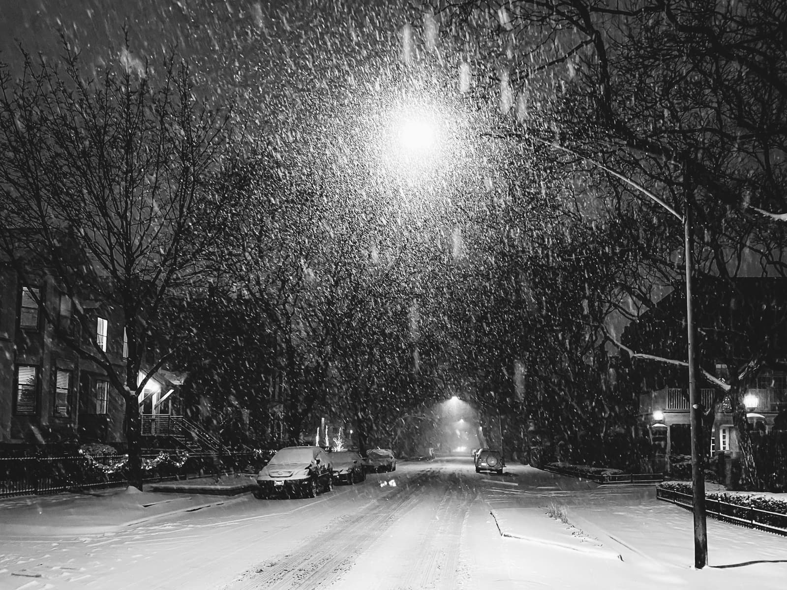 Snowing in the empty streets of Chicago at Night, 2020