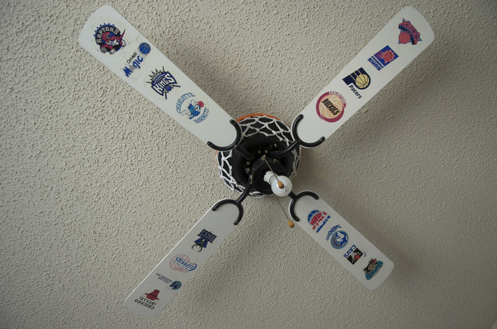 Sports themed ceiling fan at an abandoned house