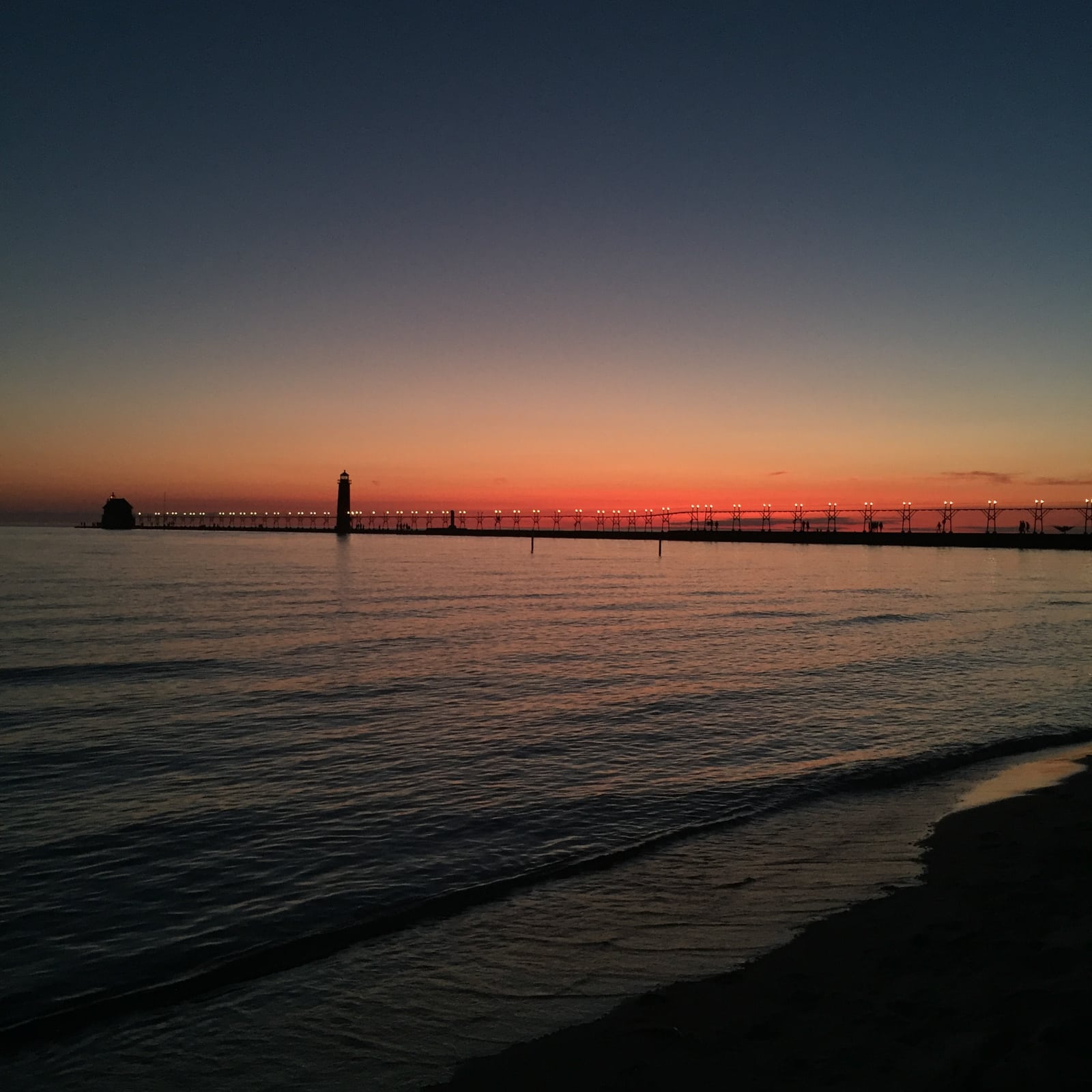 Grand Haven Beach At Sunset