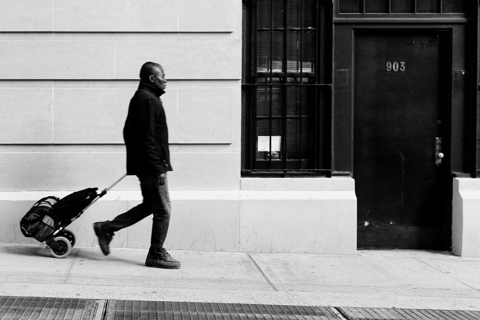 Man walking on the sidewalk in NYC