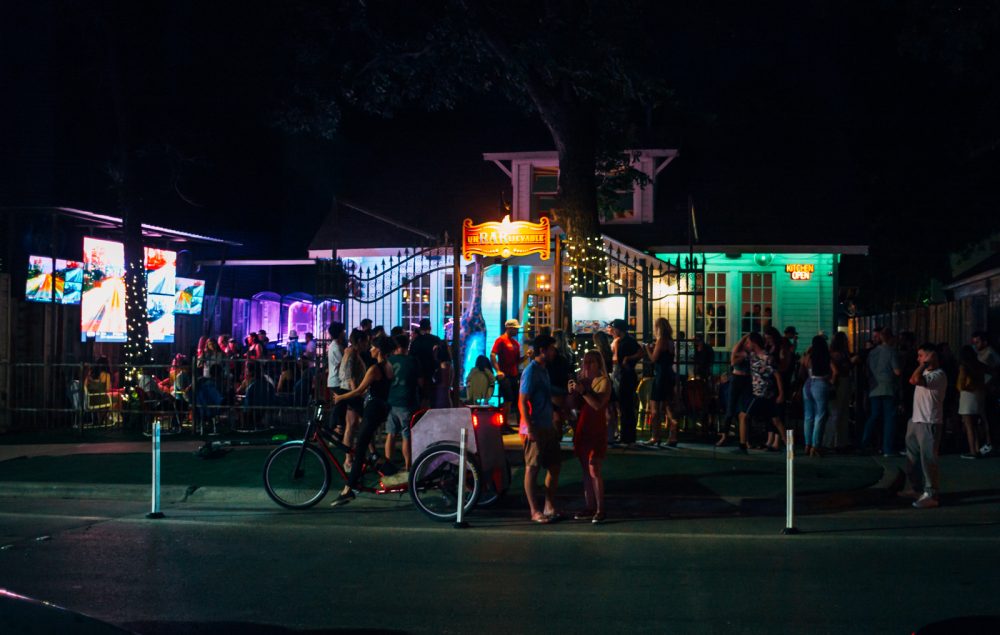 Rainey Street In Austin At Night Is Both Mysterious And Colorful