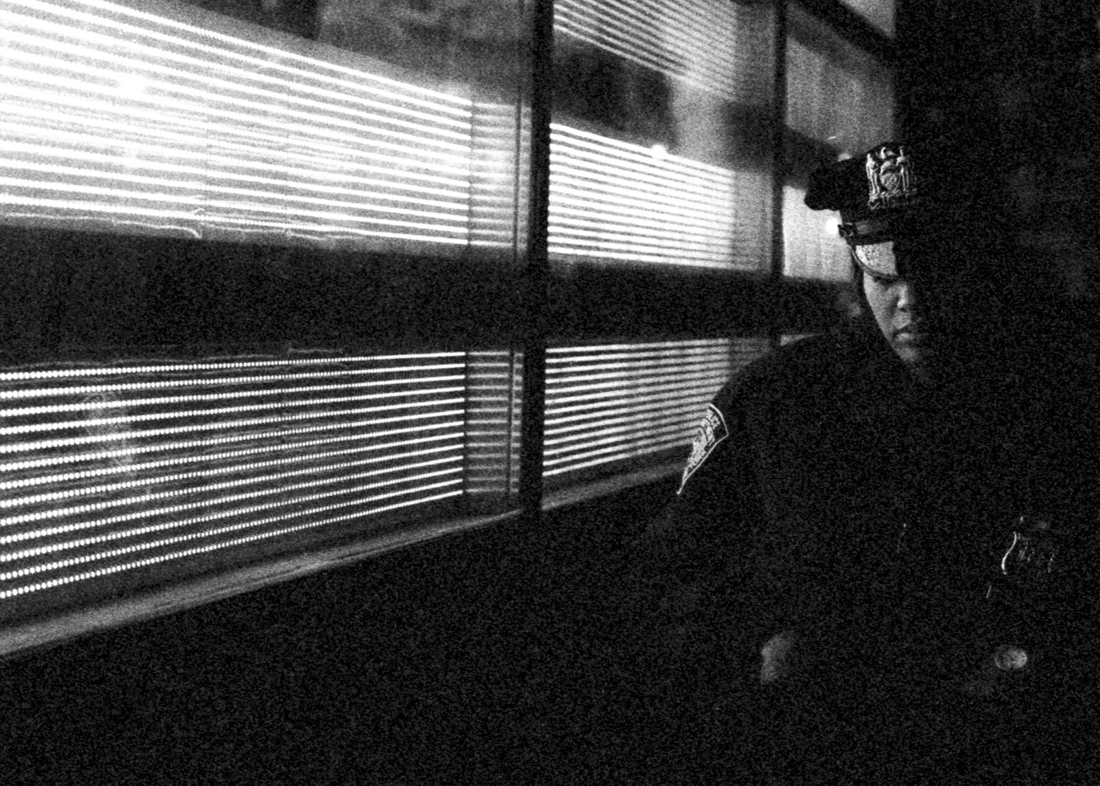 NYPD Officer - New York Street Photography At Night Shot On Ilford Delta 3200 Film