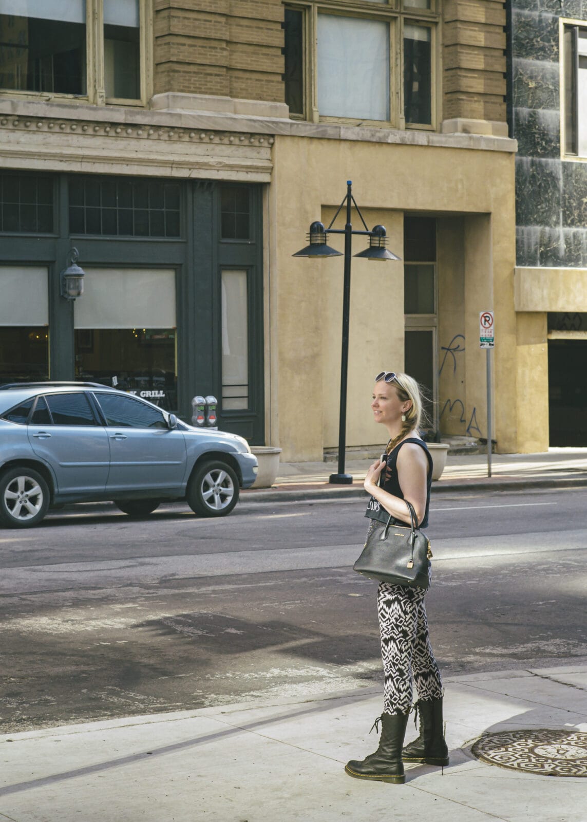 A woman standing in downtown Dallas