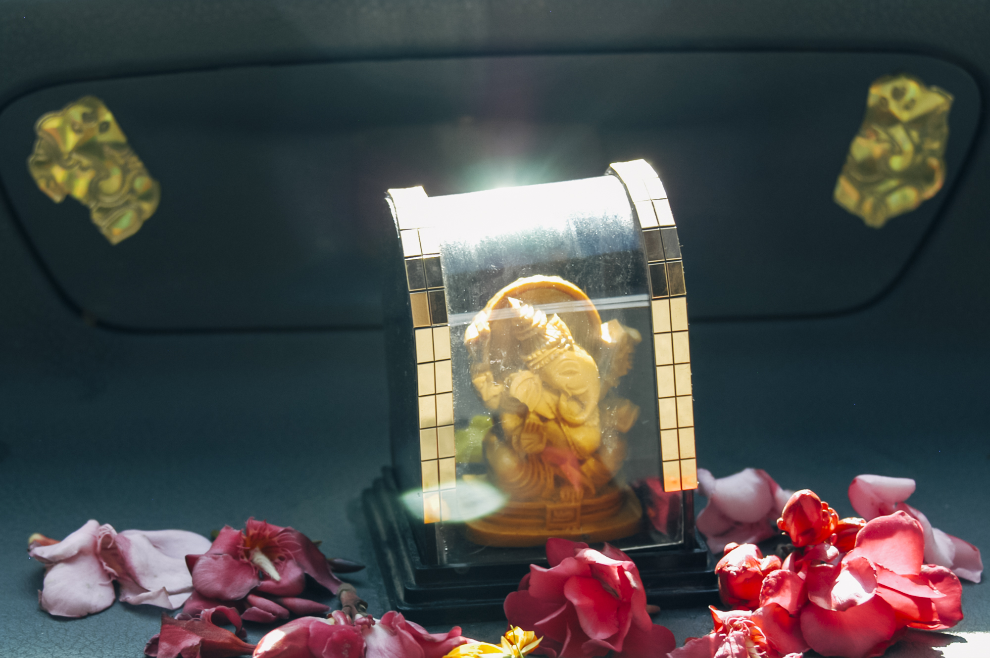 A Ganesha shrine on our taxi driver's dashboard
