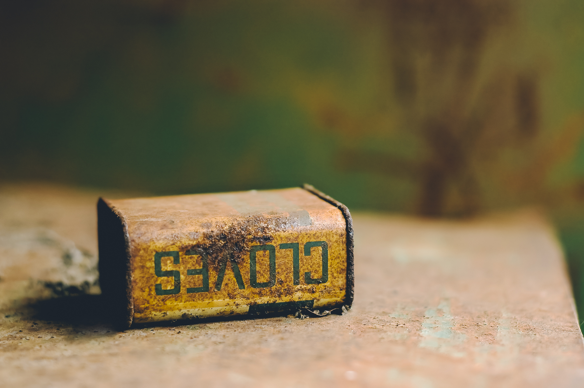 A rusted vintage Durkee's cloves tin